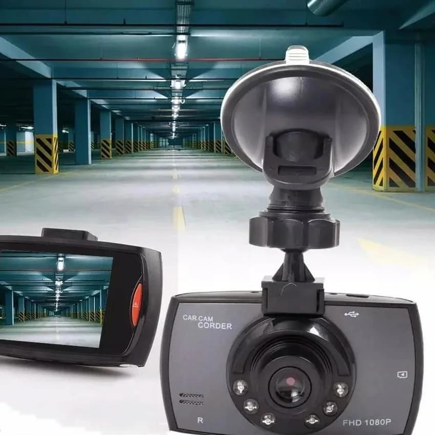Dash camera on its suction-cup holder in an underground car park